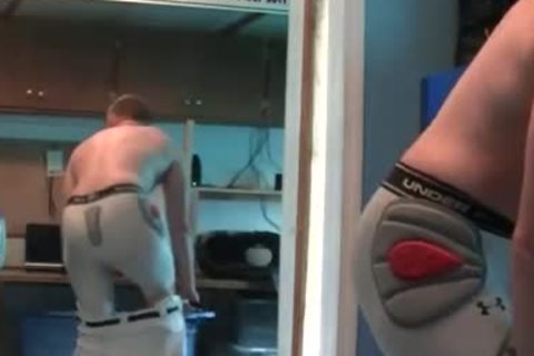 charming weenie jerking off in football gear