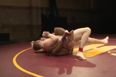 ebon And Ivory Spar On The Mat With Their ramrods Out