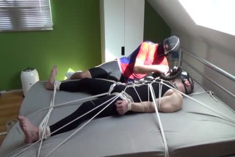 Two boys Having joy In Lycra With Breathcontrol And Magic Wand