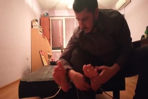 charming lad Tickled In Sneakers And darksome Socks