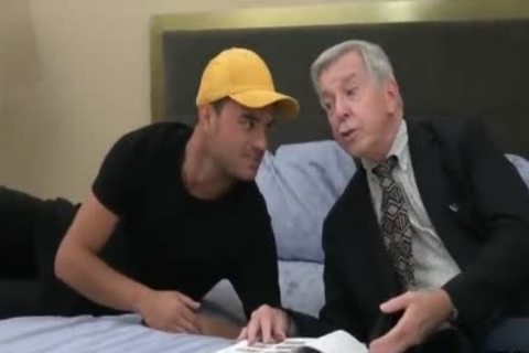 gracious old Grey Haired American Teacher And His Student