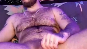 Bearded Daddy With Tattoos And hairy Chest Strokes Her cock On web camera